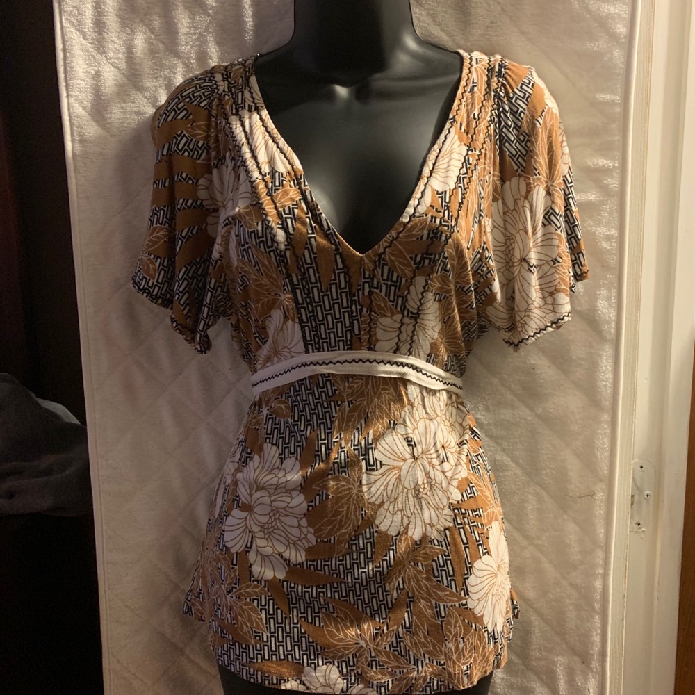 Pretty shirt. Baby doll style.